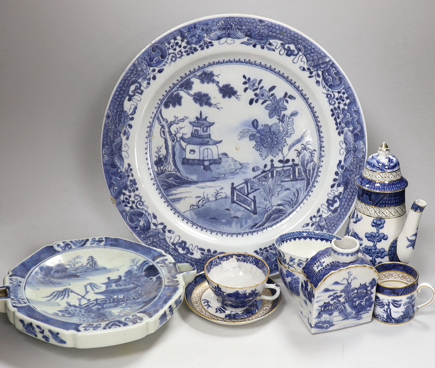 A group of English and Chinese blue and white tea and coffee wares, and a hot water dish, Chinese charger 35cms diameter